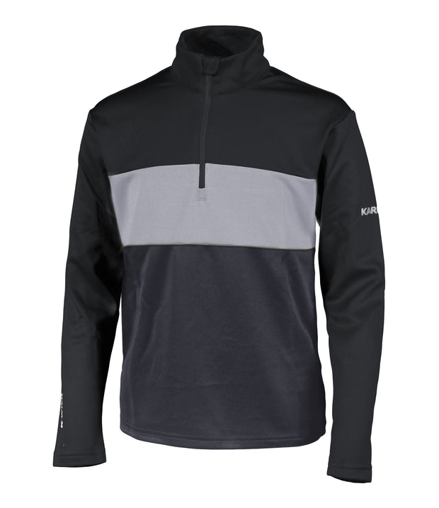A boys' 1/4 zip base layer in black, grey and dark grey with a logo on the left sleeve.