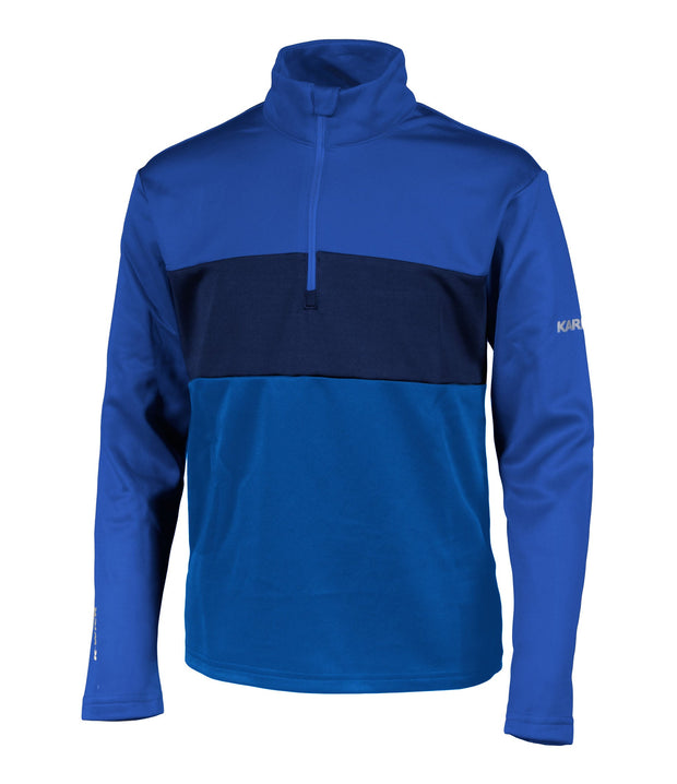 A boys' 1/4 zip base layer in blue and navy blue with a logo on the left sleeve.